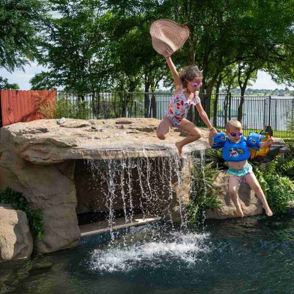 SUNSET GROVE Pool Waterfall by Universal Rocks